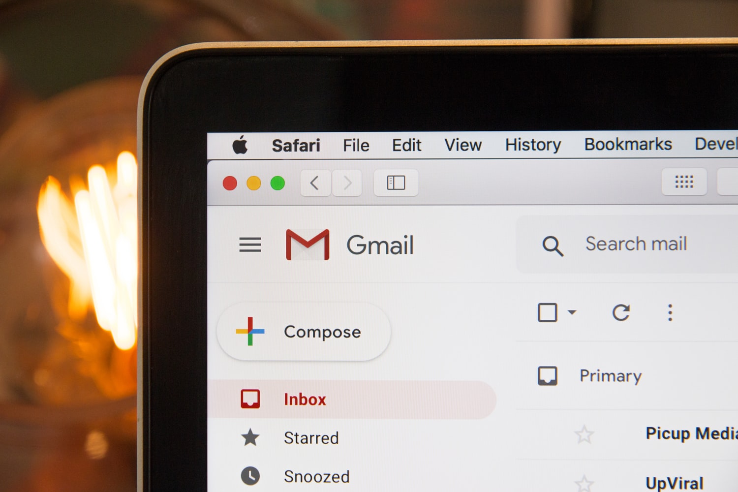 Laptop screen showing Gmail.